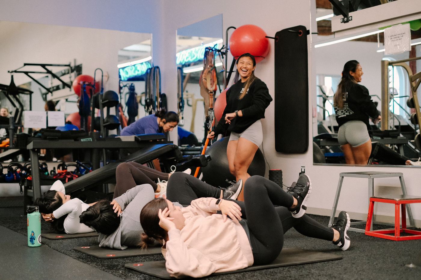 WESTCA members laughing during a core workout